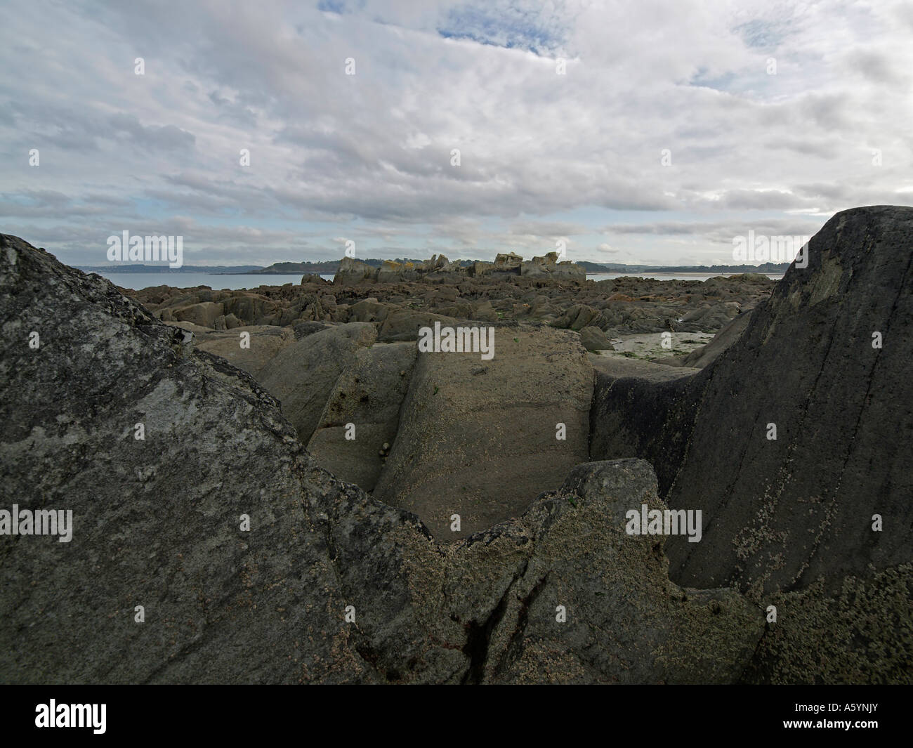 landscape stony strand at the coast in Locquirec in Finistere Brittany ...