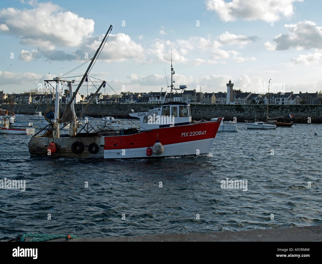 fishing boat arriving the fishing port in Roscoff Finistere Brittany France Stock Photo