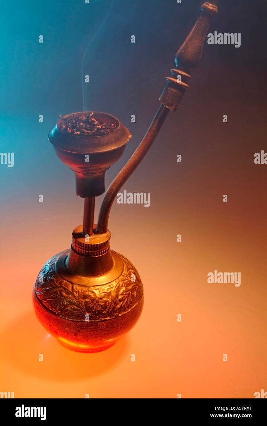 burning smoking tobacco on a bong hookah Stock Photo Alamy