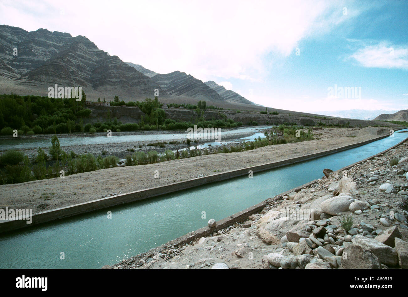 The Indus River and irrigation channel is protected by the 1960 Indus Water TReaty agreement between Pakistan and India Stock Photo