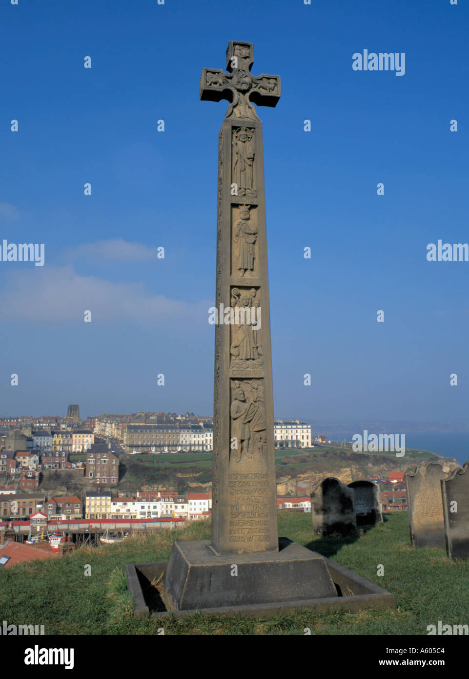 The cross in memory of Caedmon, St Mary's Churchyard, Whitby, North Yorkshire, England, UK. Stock Photo