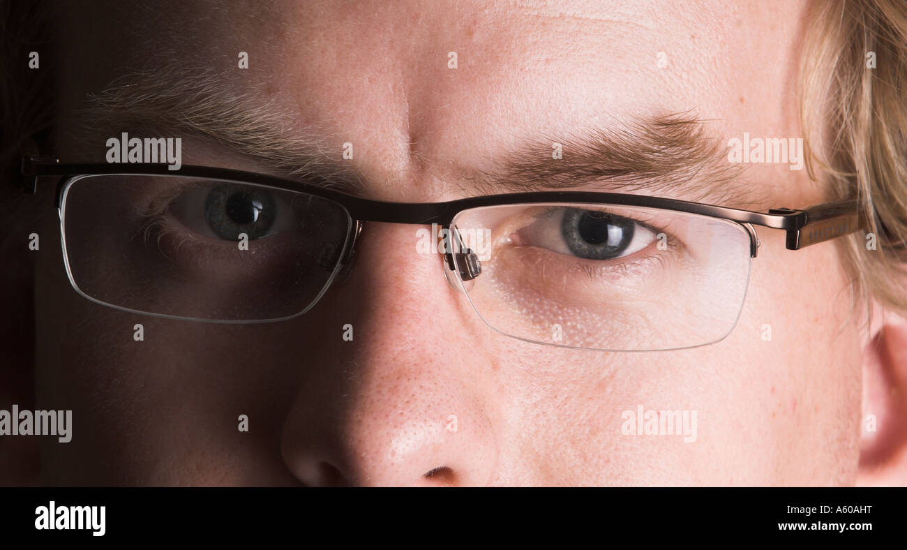 Young man's portrait with glasses Stock Photo - Alamy