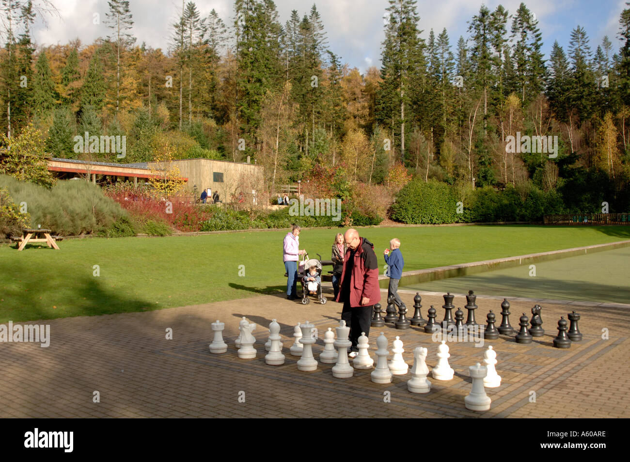 Playing outdoor chess, Centre Parcs, Longleat, England, UK, Europe