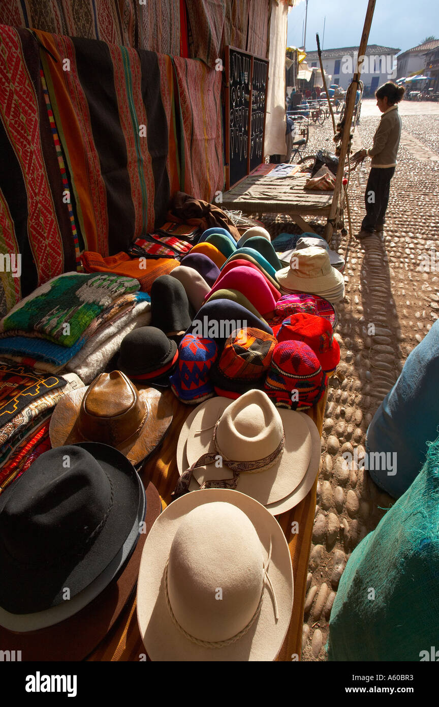 hats on stall market day in the square Pisac Sacred Valley nr Cusco Peru Stock Photo