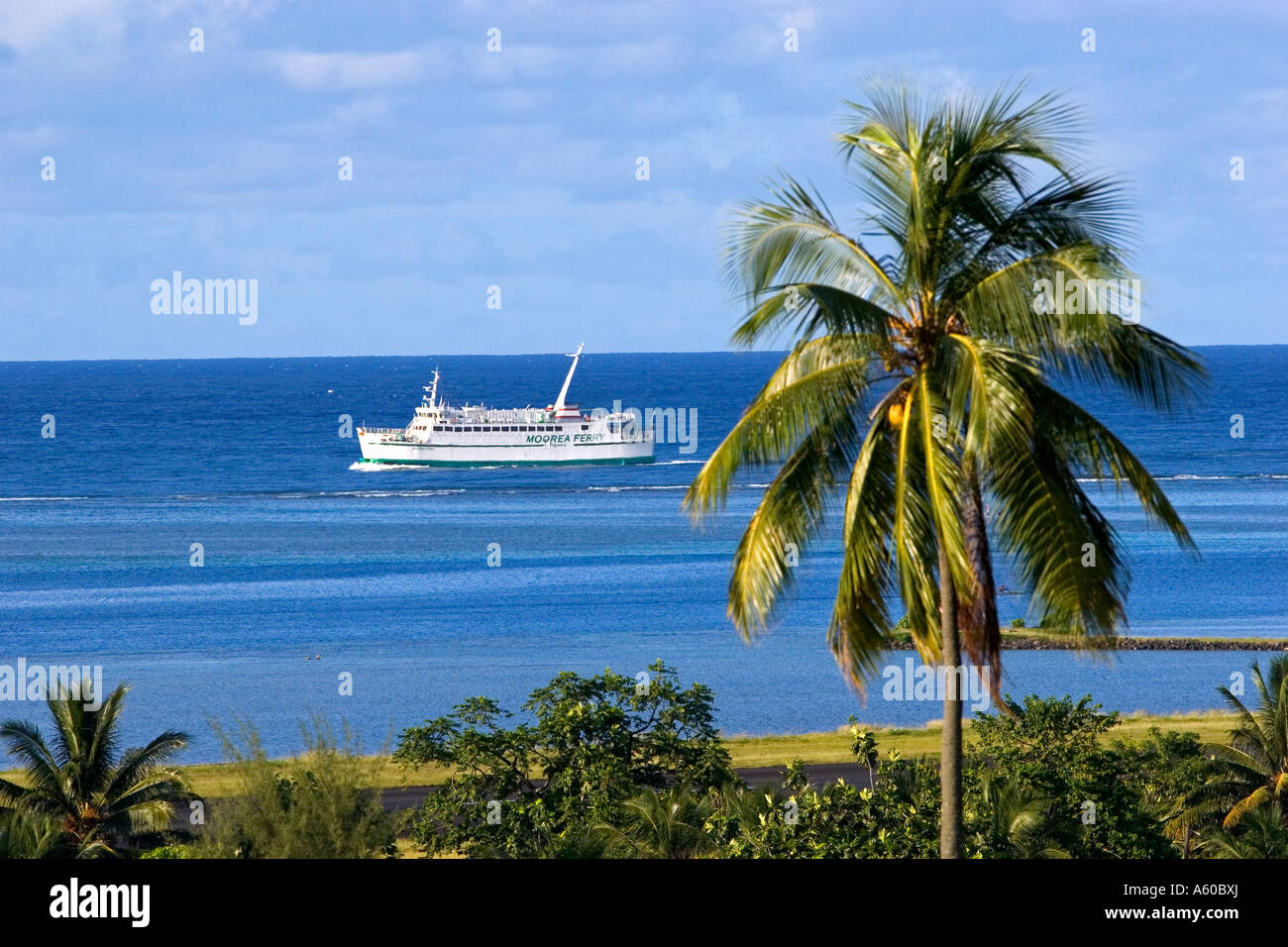 A ferry boat travels from the island of Moorea to the city of Papeete