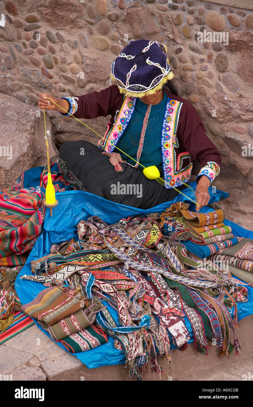 women weaving textiles in the square Pisac Sacred Valley nr Cusco Peru Stock Photo