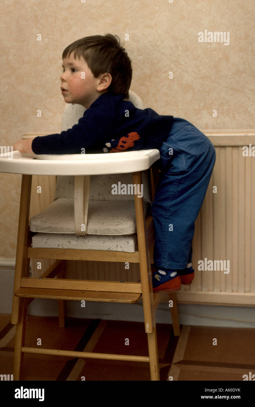 Toddler climbing chair hires stock photography and images Alamy