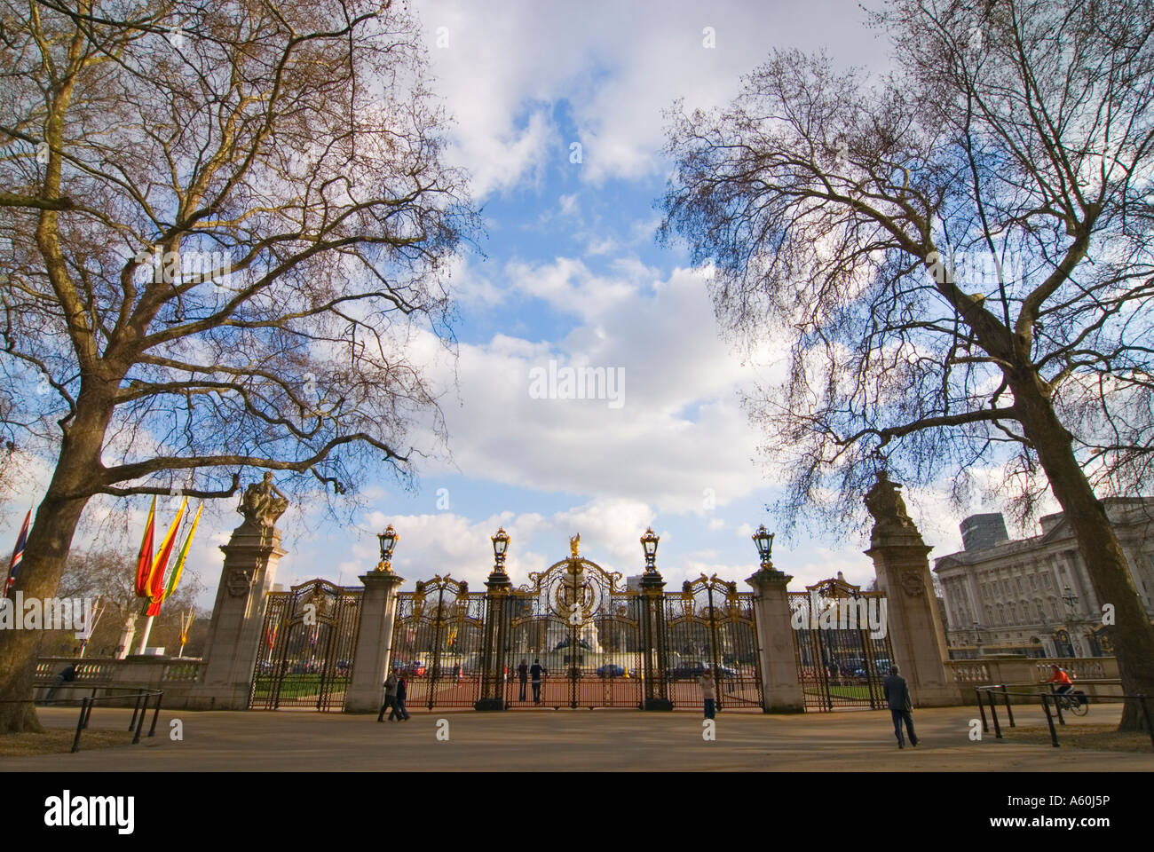 Horizontal wide angle of the huge ornamental black and gold wrought iron gates of Green Park. Stock Photo