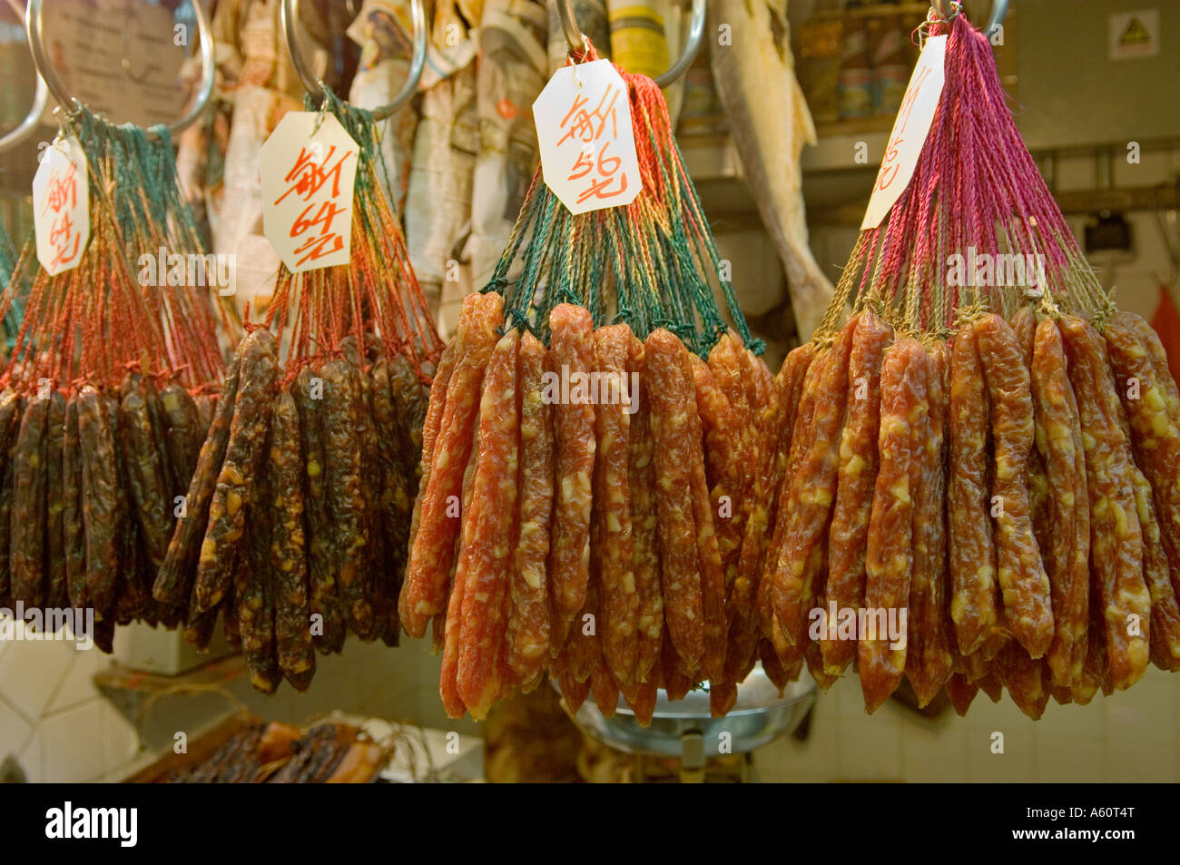 Dry cured sausage meat for sale on market stall in Mong Kok area of
