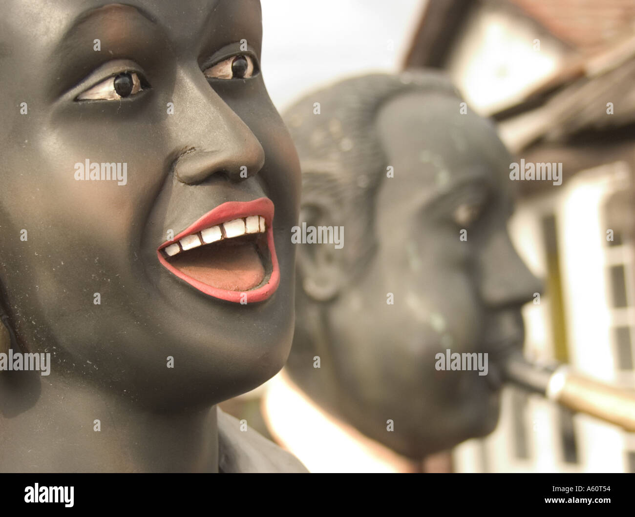 Profiles Of Two Jazz Musicians In Action Sculptured In Black
