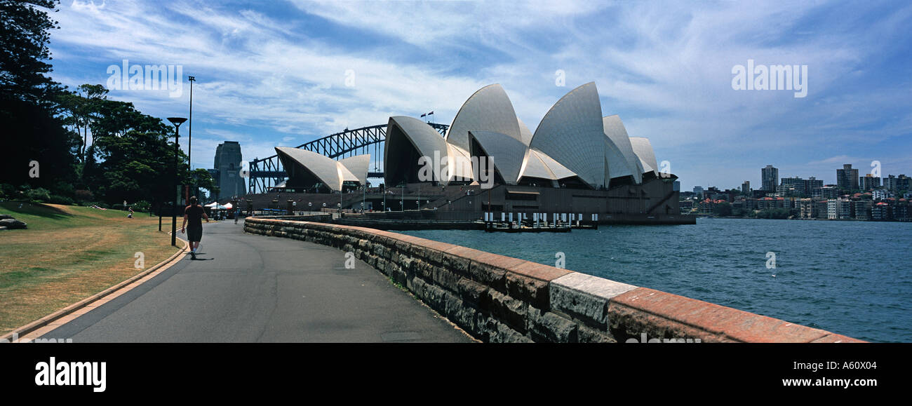 The waterfront and park beside the harbour and Sydney Opera House Syndey New South Wales Australia Stock Photo