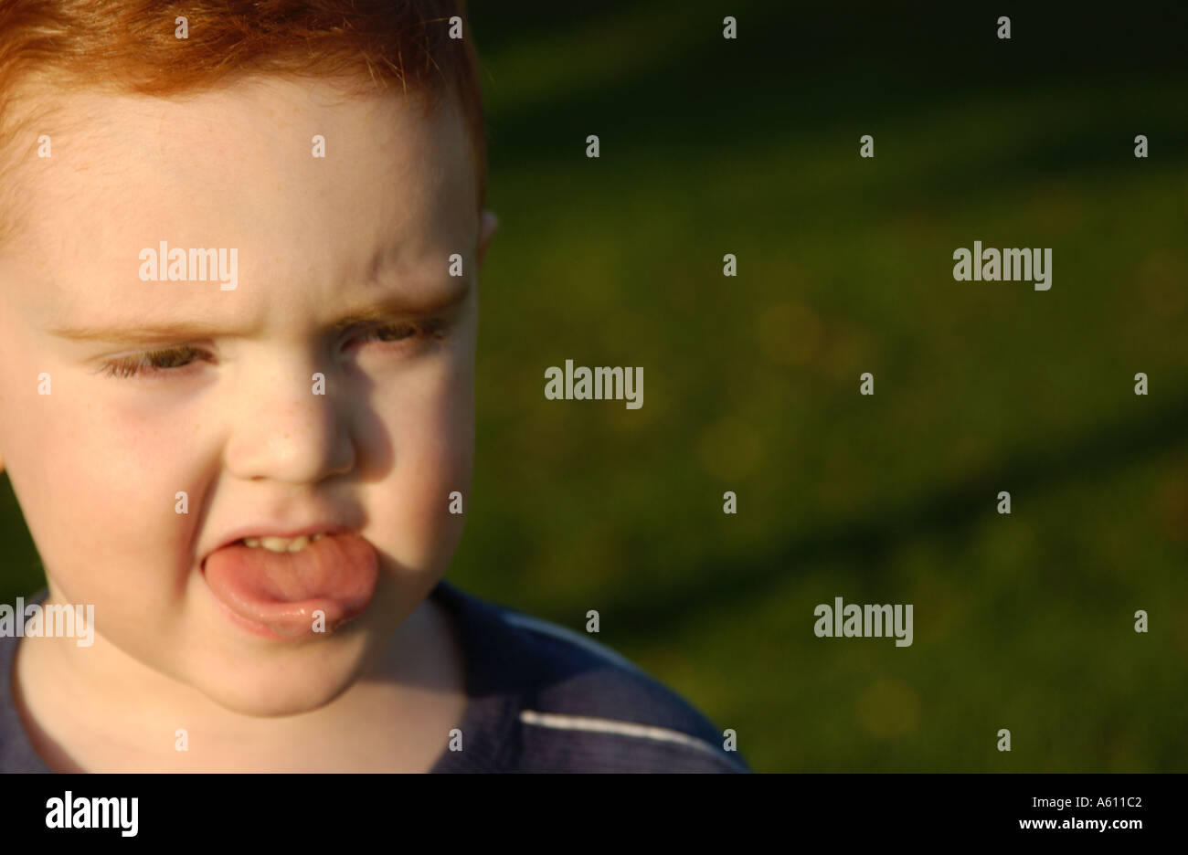 Red haired boy with different facial expressions Stock Photo