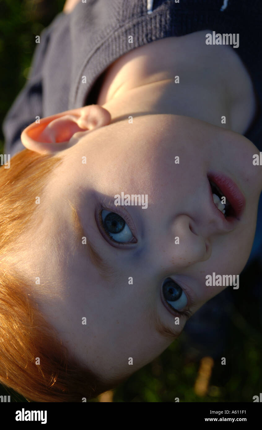 Red haired boy with different facial expressions Stock Photo