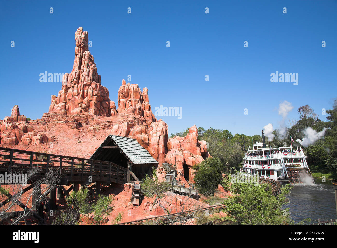 Big Thunder Mountain Railroad ride, Liberty Belle Paddle Steamer, Magic Kingdom, Disney World, Orlando, Florida, USA Stock Photo