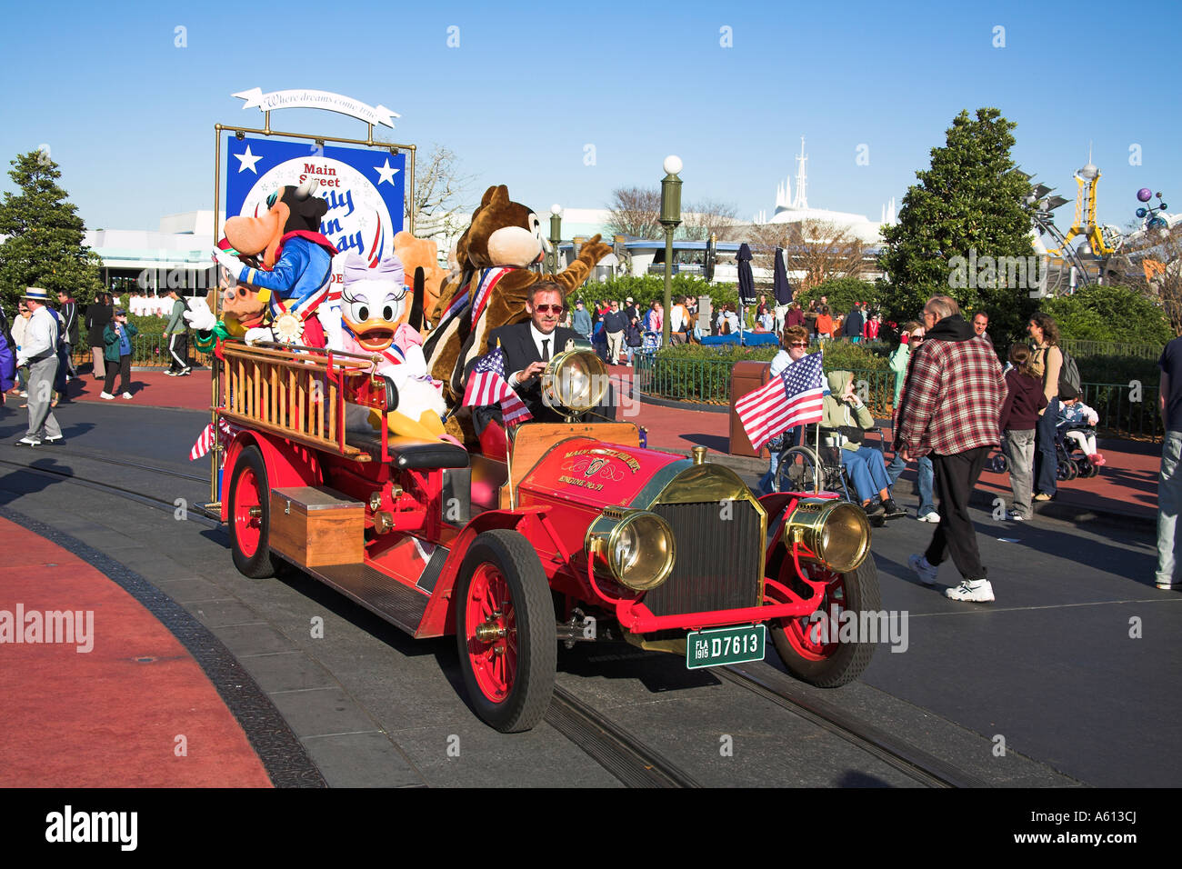 Fire tender and Disney characters, Main Street Family Fun Day Parade, Magic Kingdom, Disney World, Orlando, Florida, USA Stock Photo