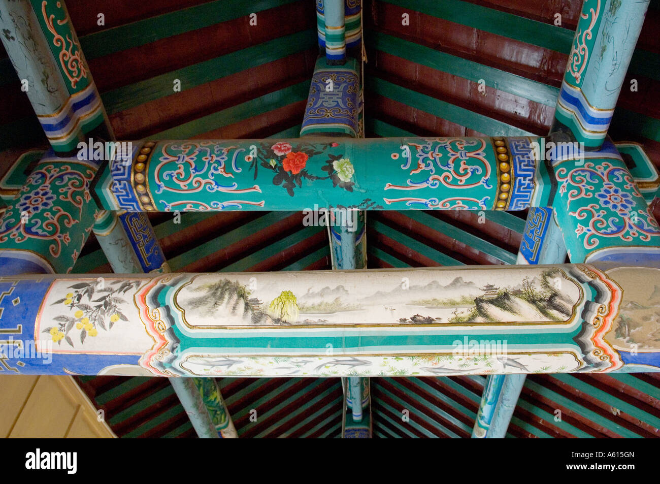 Yantai city China. Temple of the Heavenly Queen also known as Fujian Guildhall. Painted roof beams in the temple museum complex Stock Photo