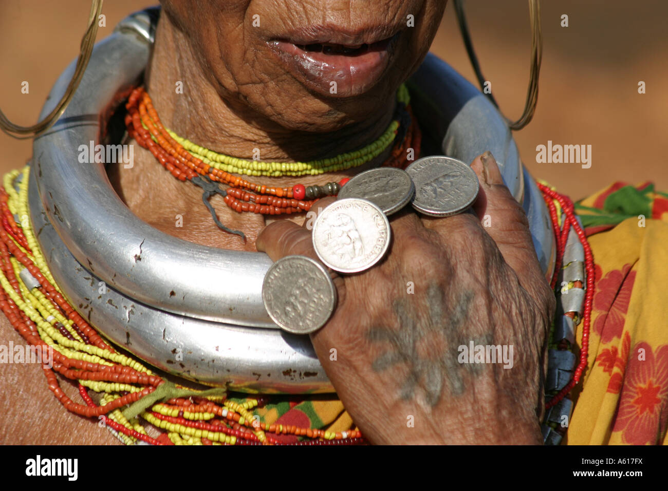 Gadaba tribal woman wearing rings made up of coins celebrating the year of Indian independence  1947 for India Stock Photo