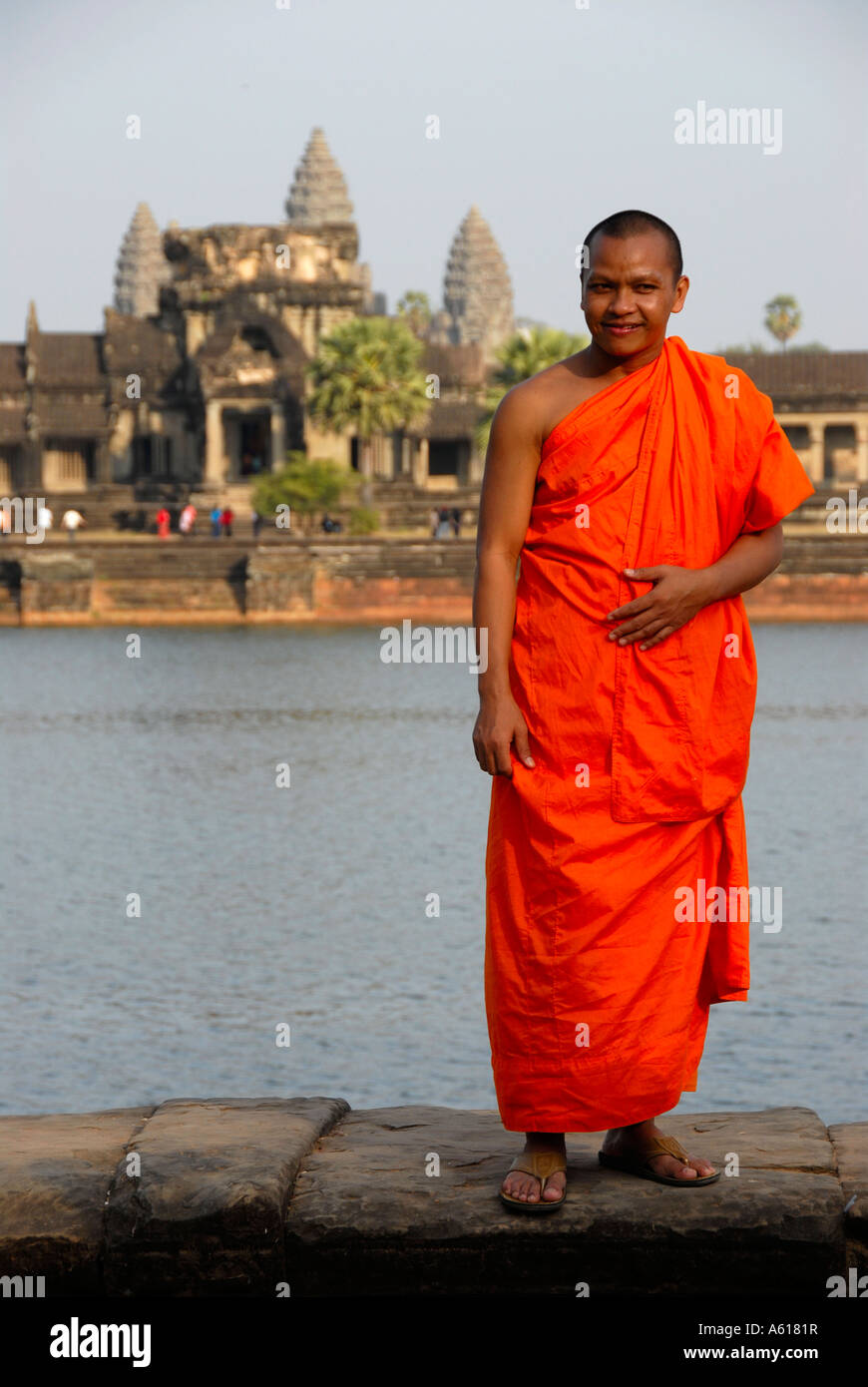 Buddhist monk in orange robe at temple Angkor Wat Siem Reap Cambodia Stock  Photo - Alamy