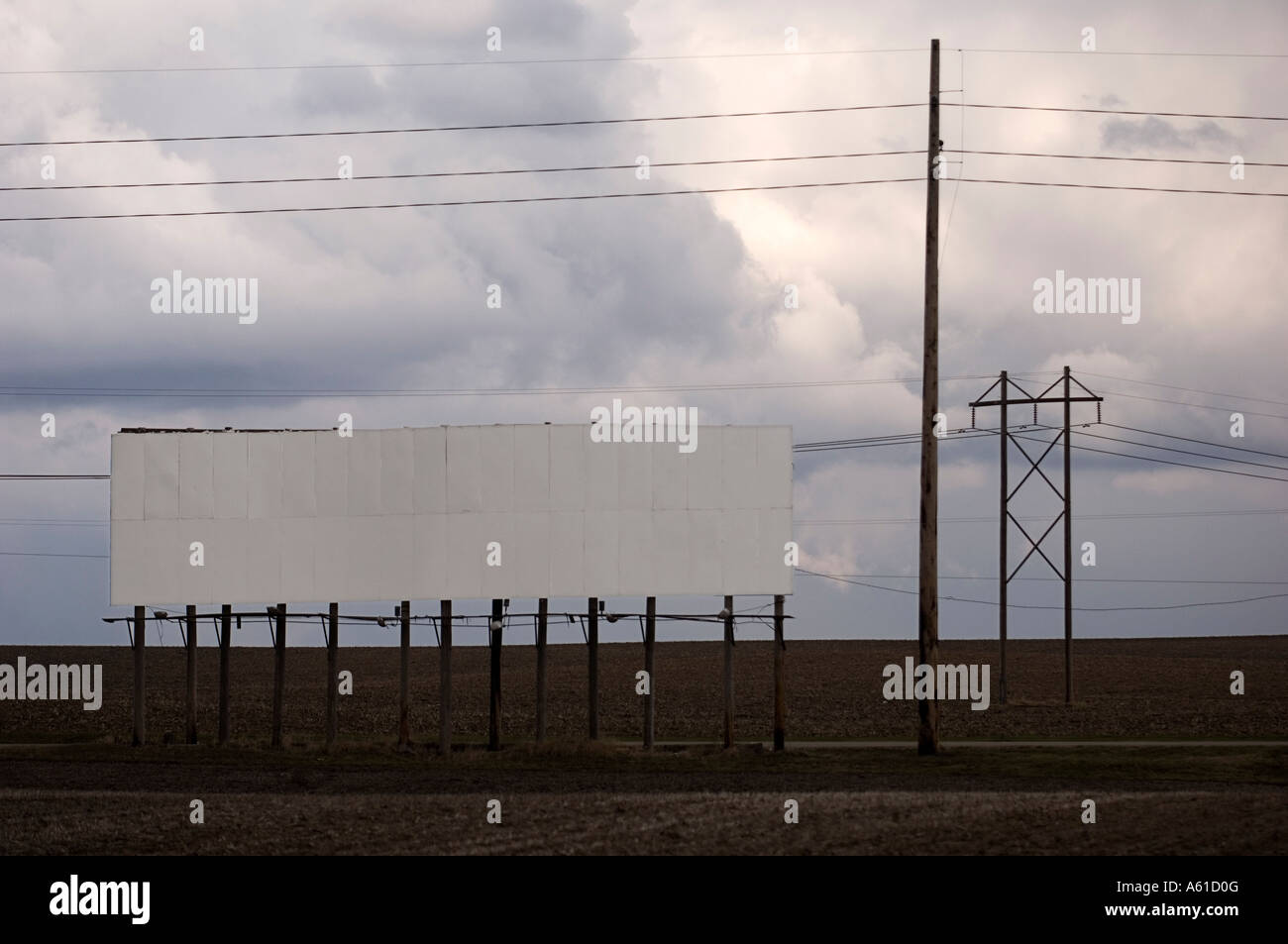 Billboard and powerlines Stock Photo