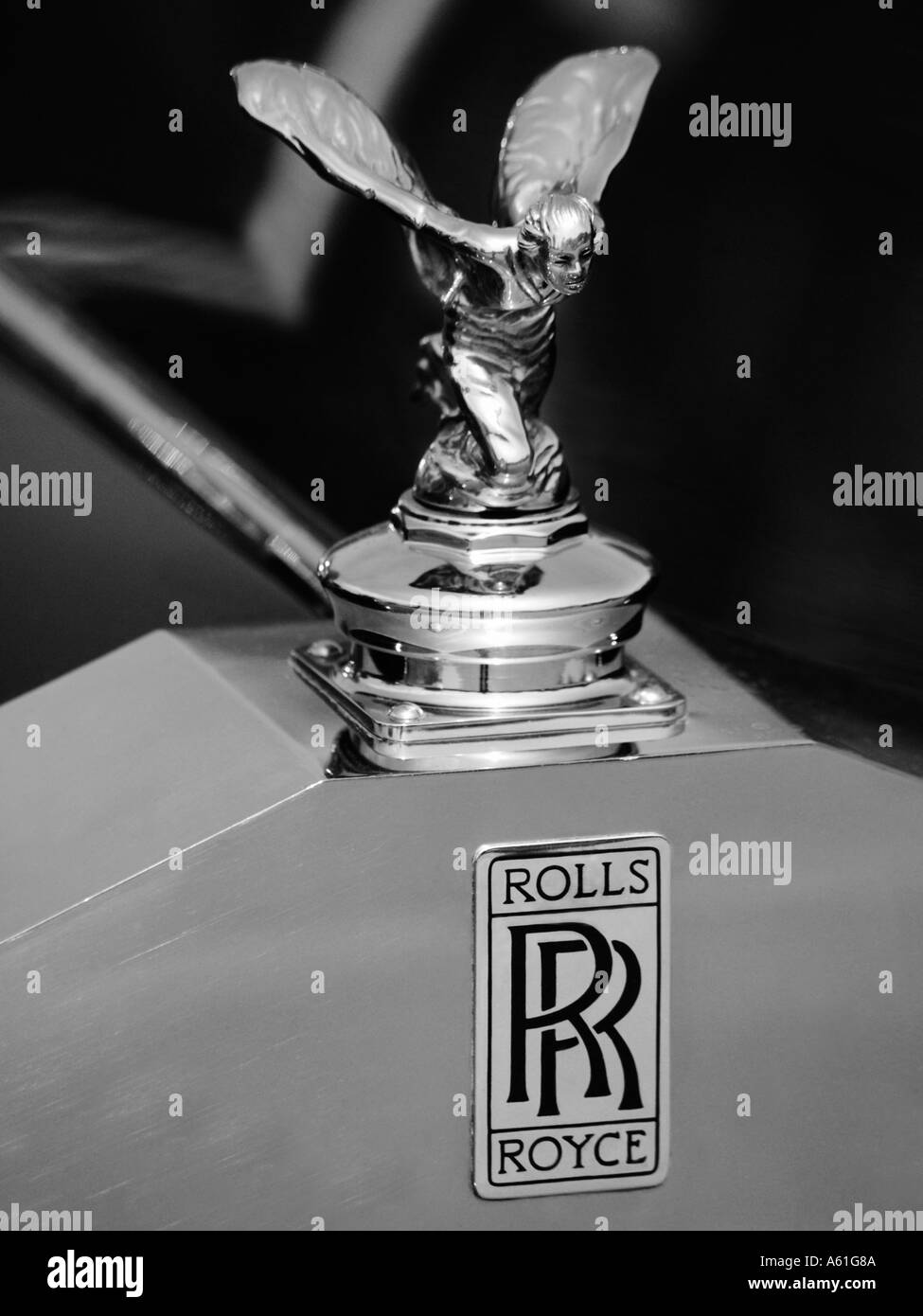 Black and white monochrome shot of a classic Rolls Royce hood ornament  emblem sliver lady spirit of ecstacy Stock Photo - Alamy
