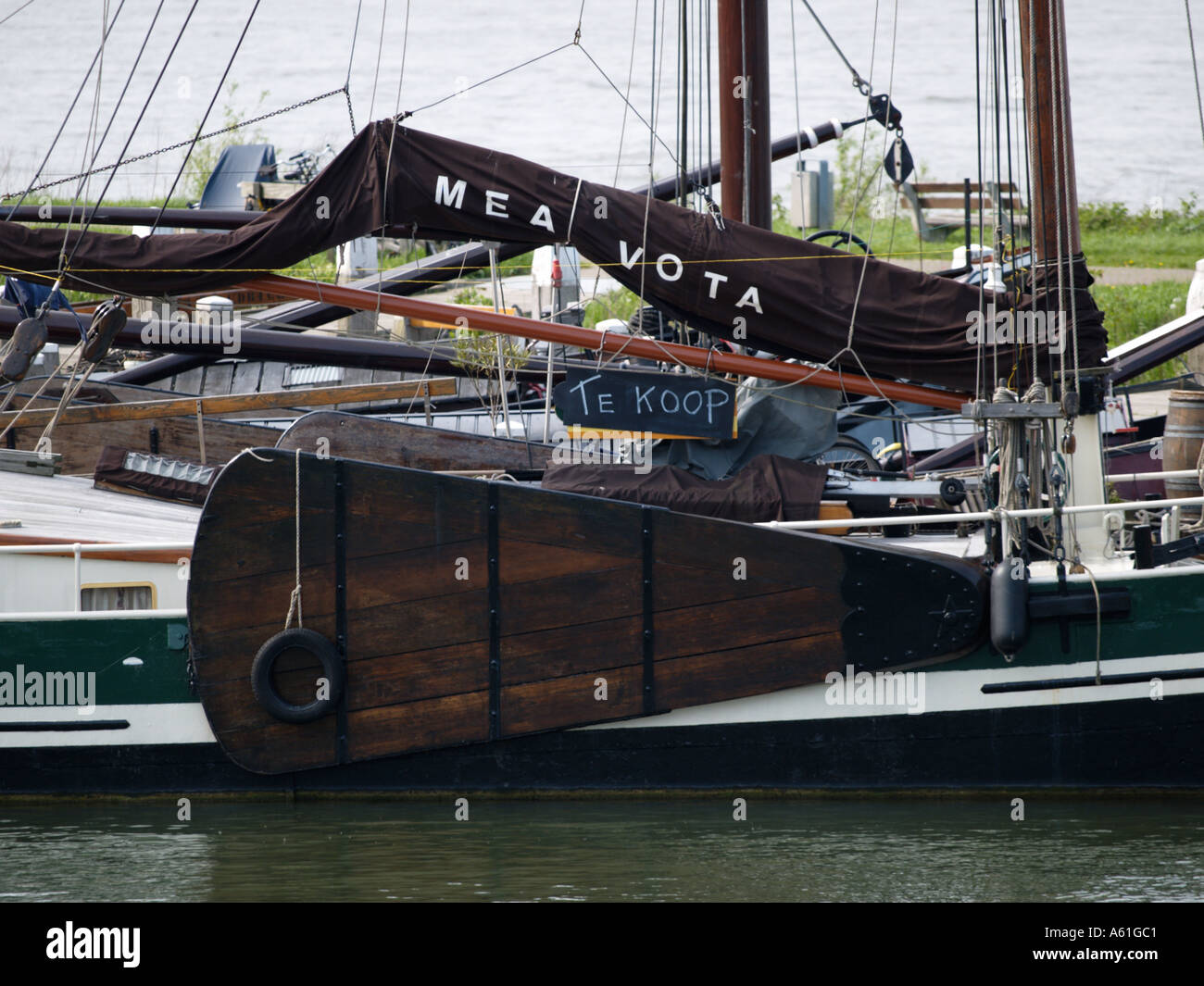 Historic Dutch flat bottom boat offered for sale in the historic river port of Woudrichem Noord Brabant the Netherlands Stock Photo