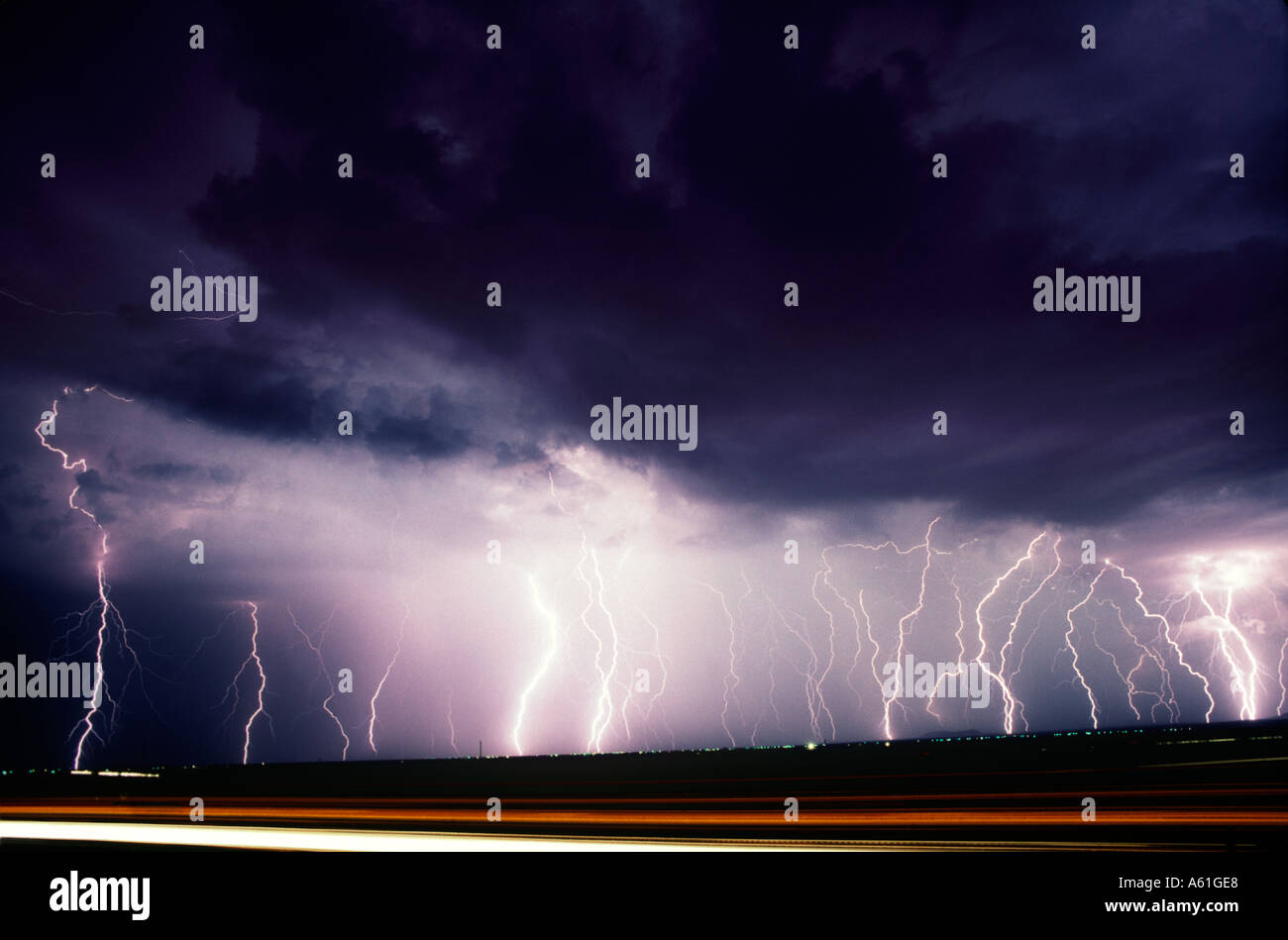 Lightning bolts strike down between Casa Grande and Picacho in Arizona, USA. Stock Photo