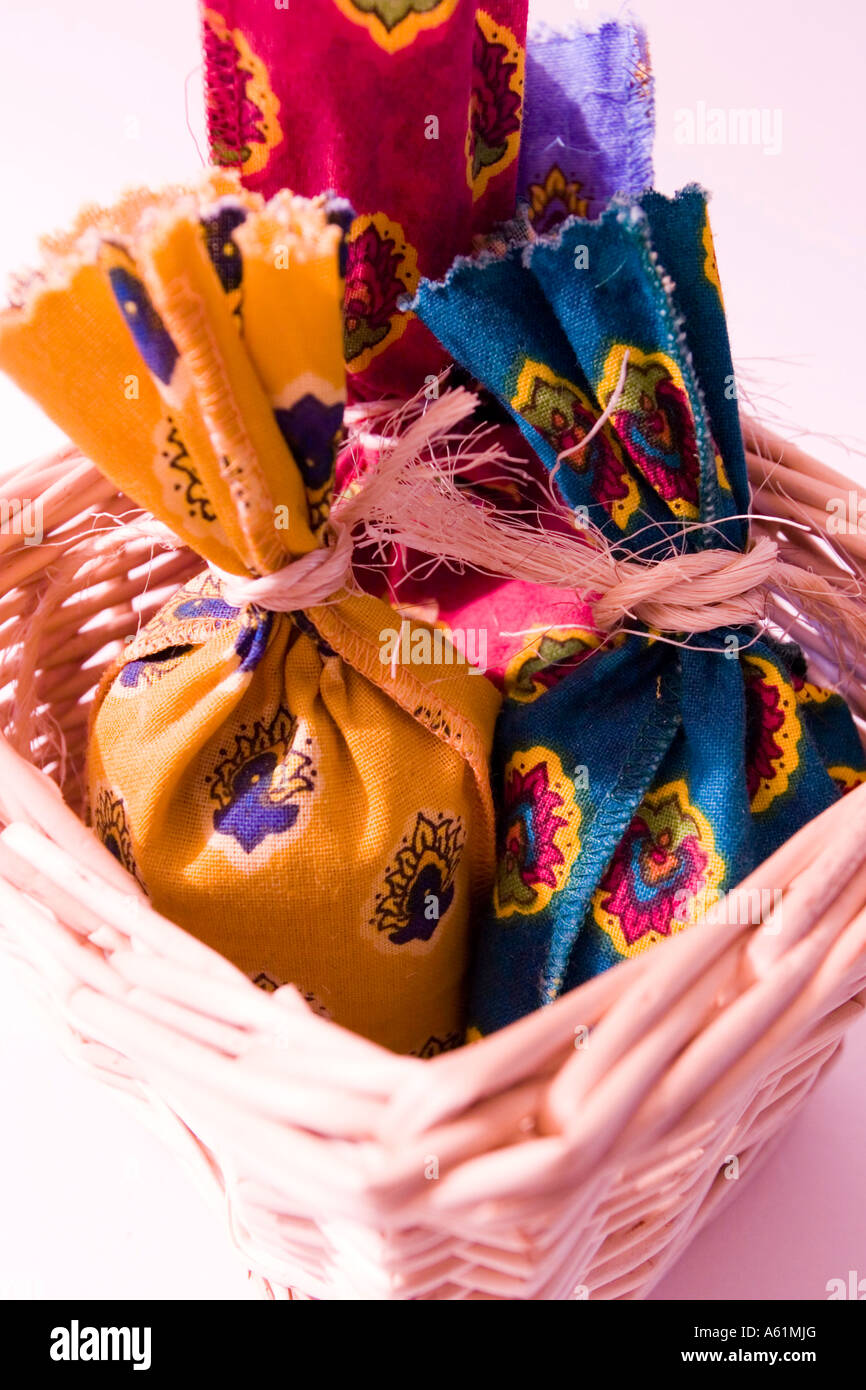 basket of Provencal calico bags containing herbs Stock Photo