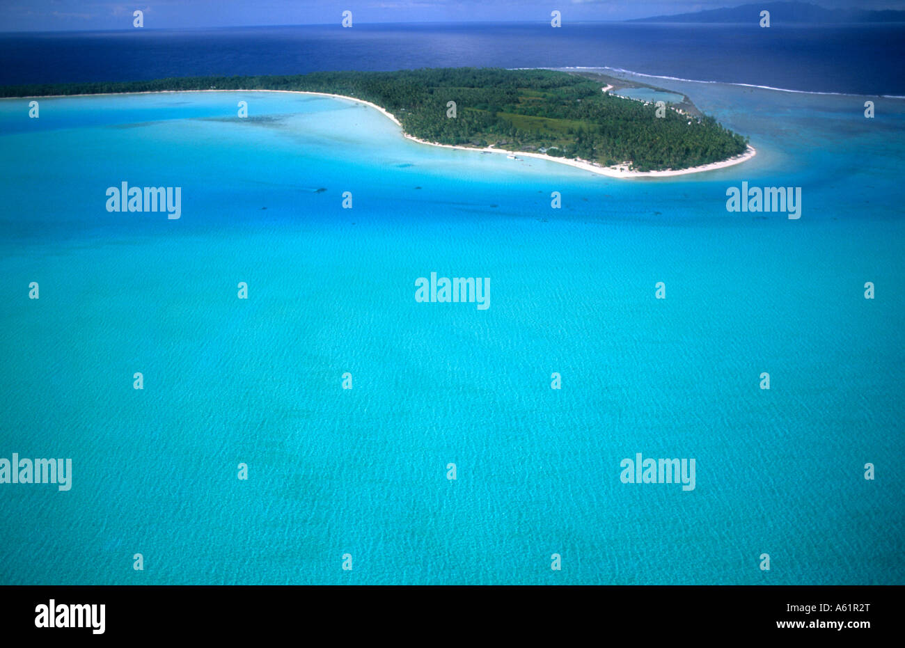 Aerial of the green water and clear blue colors of the islands of Bora
