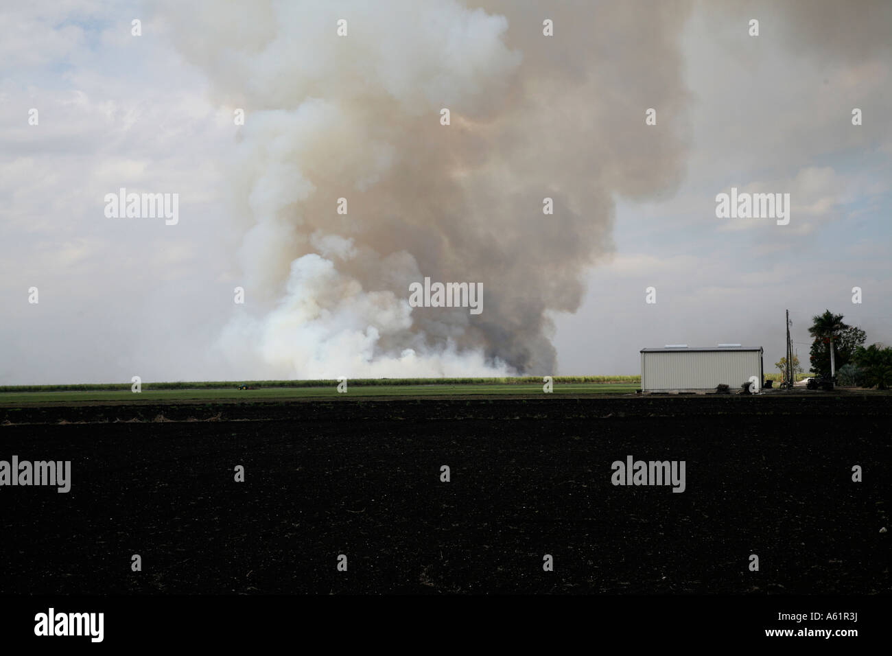 Air pollution from a garbage dump fire near Sebring Florida USA Stock Photo
