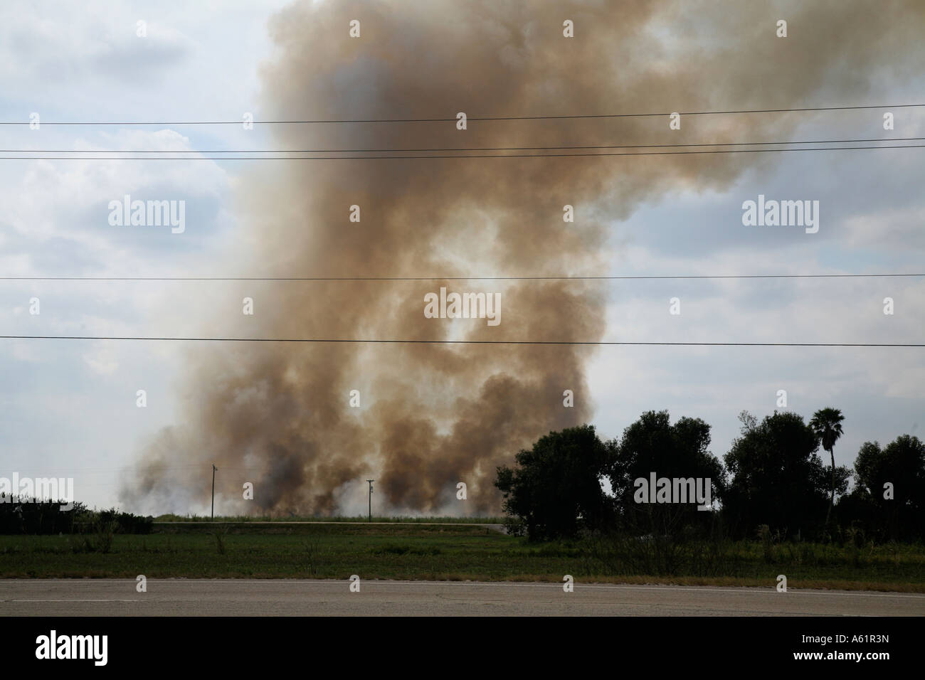 Air pollution from a garbage dump fire near Sebring Florida USA Stock Photo