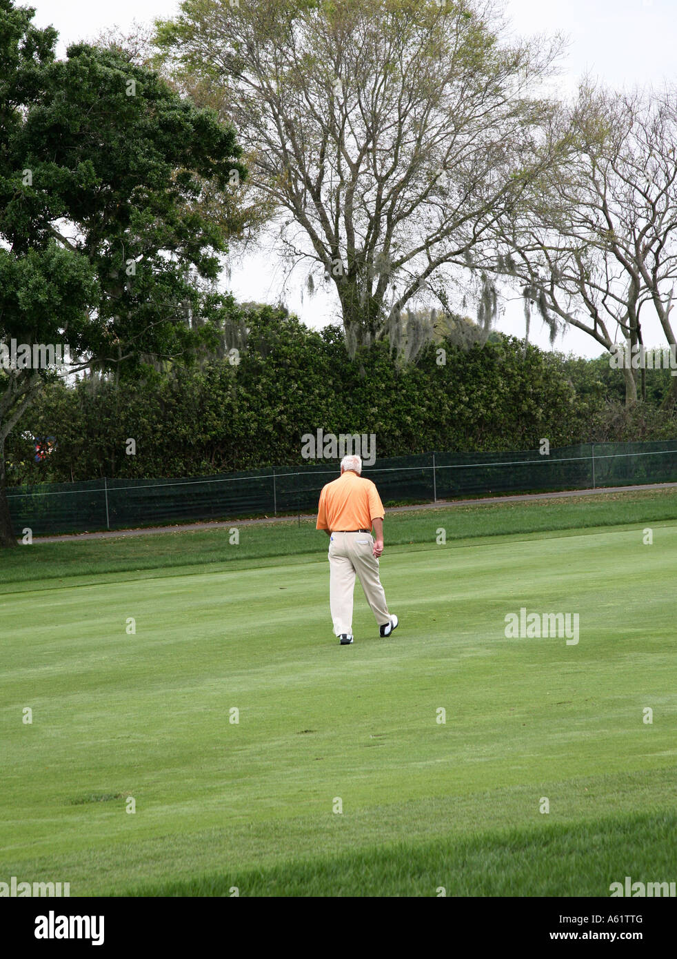 Arnold Palmer walking on his golf course in Bay Hill Florida Stock Photo