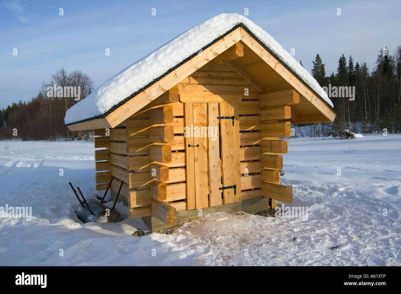 View of a typical Finnish log cabin, Luosto, Lapland, Northern Finland, Europe, Arctic Stock Photo