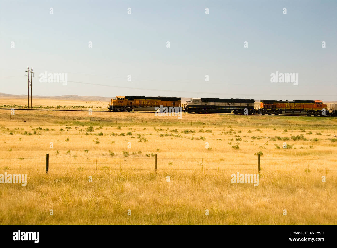 Train passing though the mid west plains of America Stock Photo Alamy