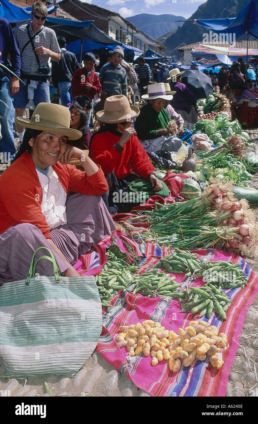 PERU Cusco Department Pisac Line of vegetable sellers at market. Stock Photo