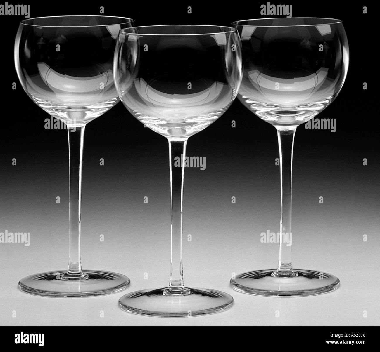 Three long stem wine glasses Stock Photo Alamy