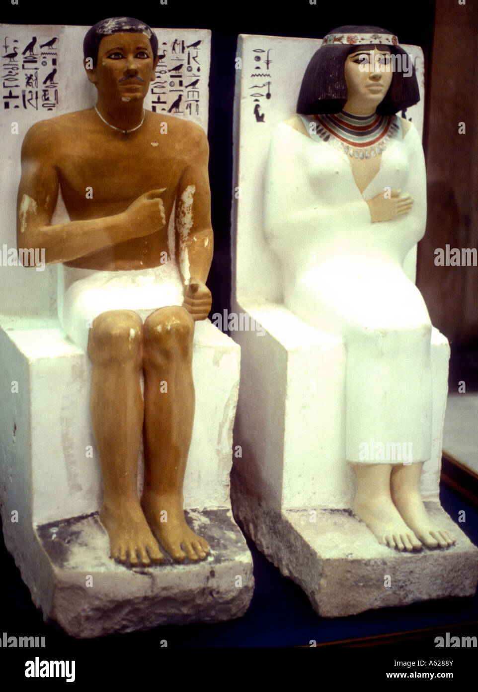Painted carved models of Nofret an Rahotep Egyptian Museum of Antiquities Cairo Egypt Stock Photo