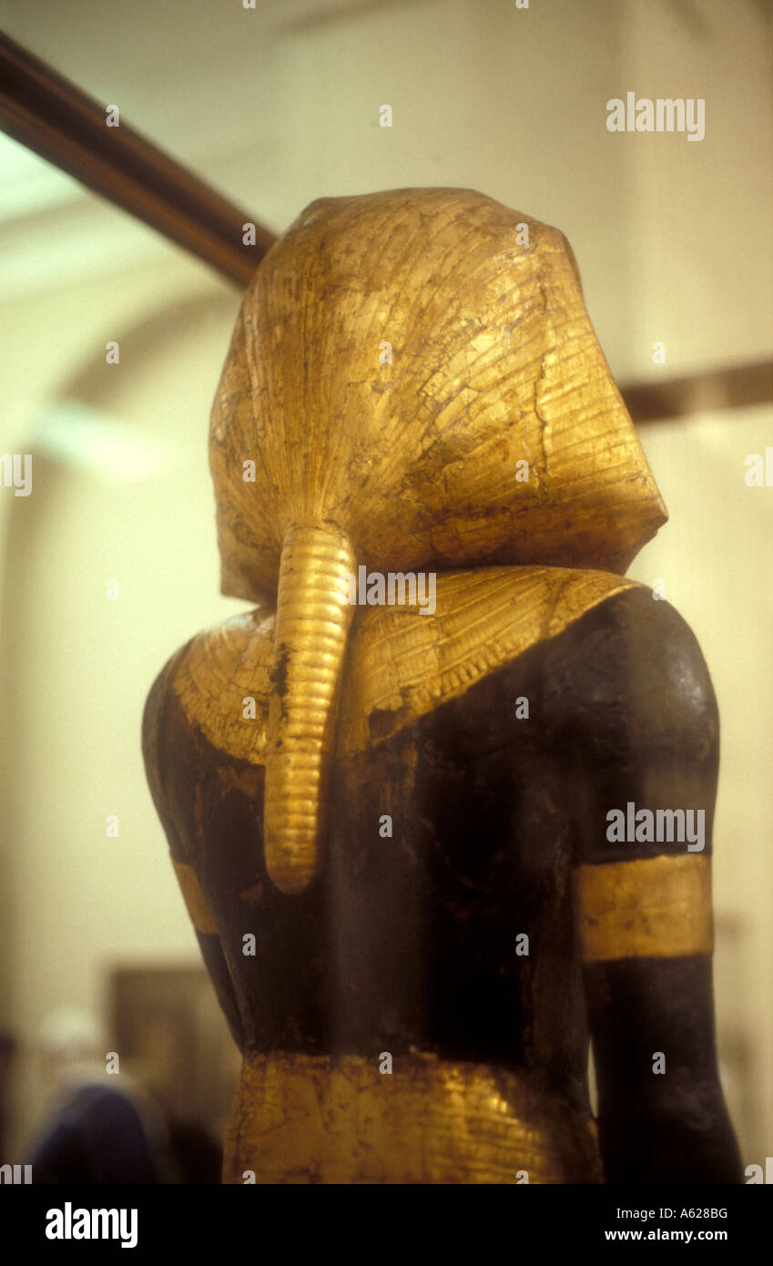 Close up of back of hair do of gilded wooden statue Egyptian Museum of