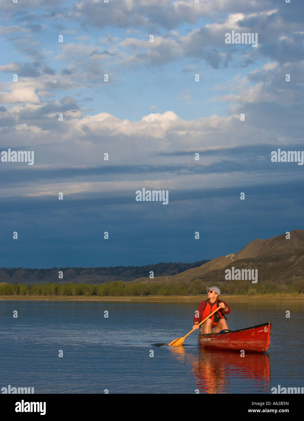 man in canoe Stock Photo - Alamy