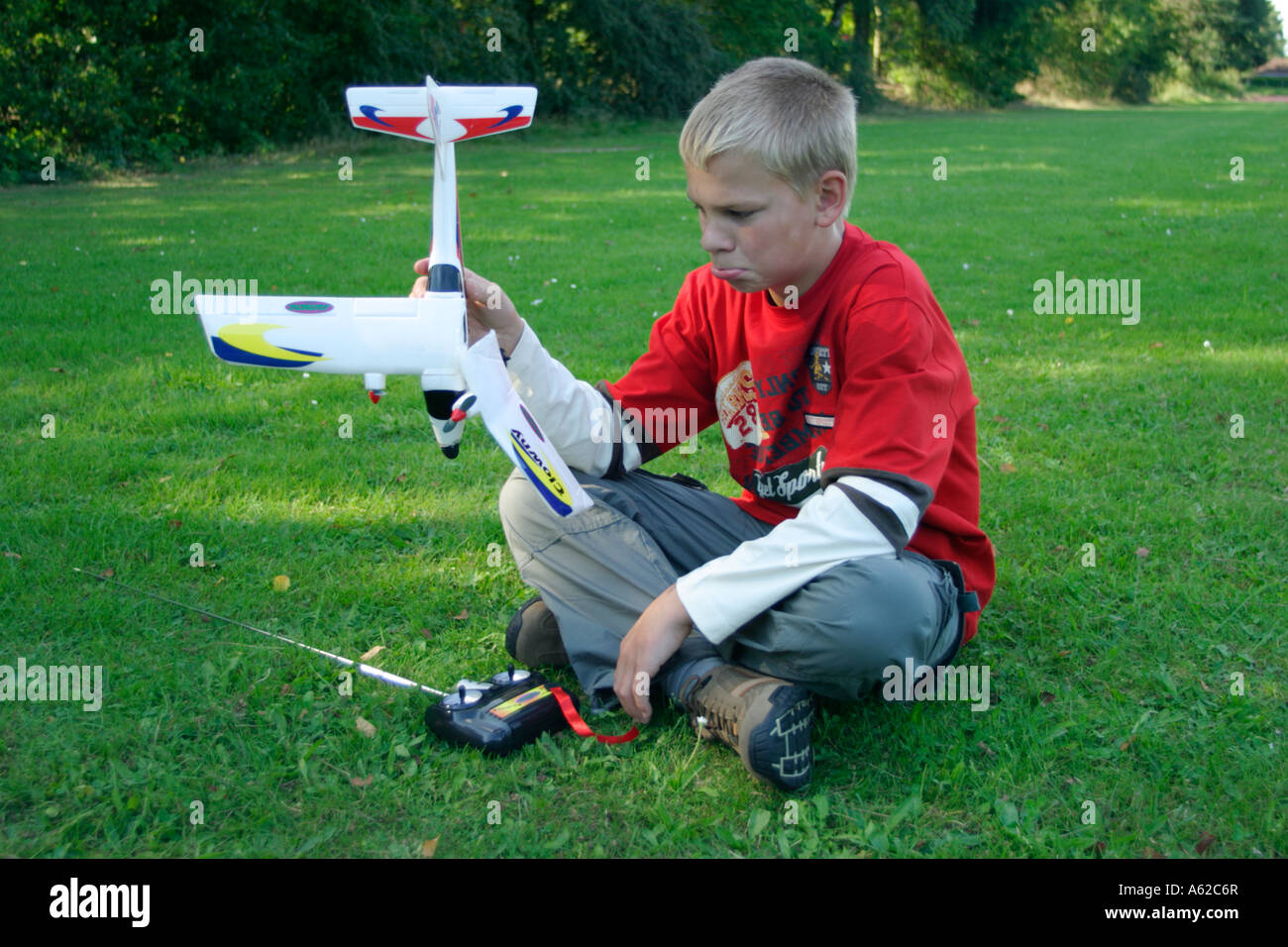 Child with broken toy hires stock photography and images Alamy
