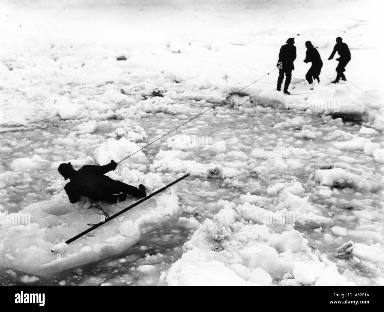 On an ice floe trying to cut the Endurance free Imperial Trans Antarctic  Expedition Stock Photo - Alamy