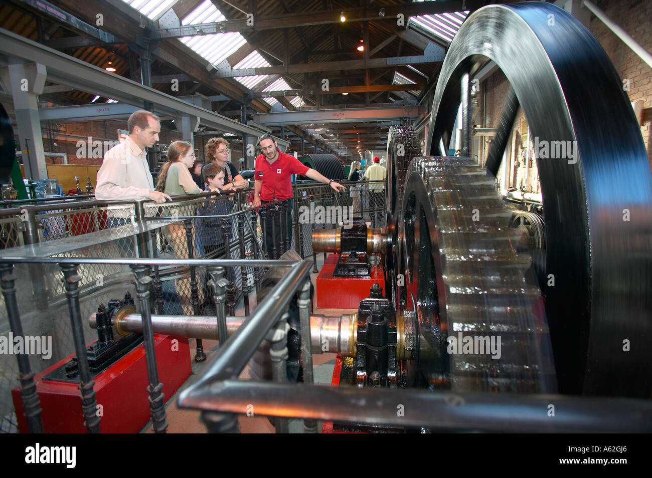 family exploring an industrial museum Stock Photo