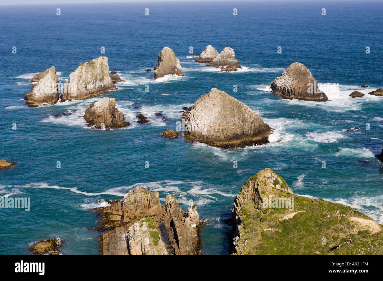 Off Shore Rocks Headland with offshore rocks at Nugget Point the Catlins South Island ...