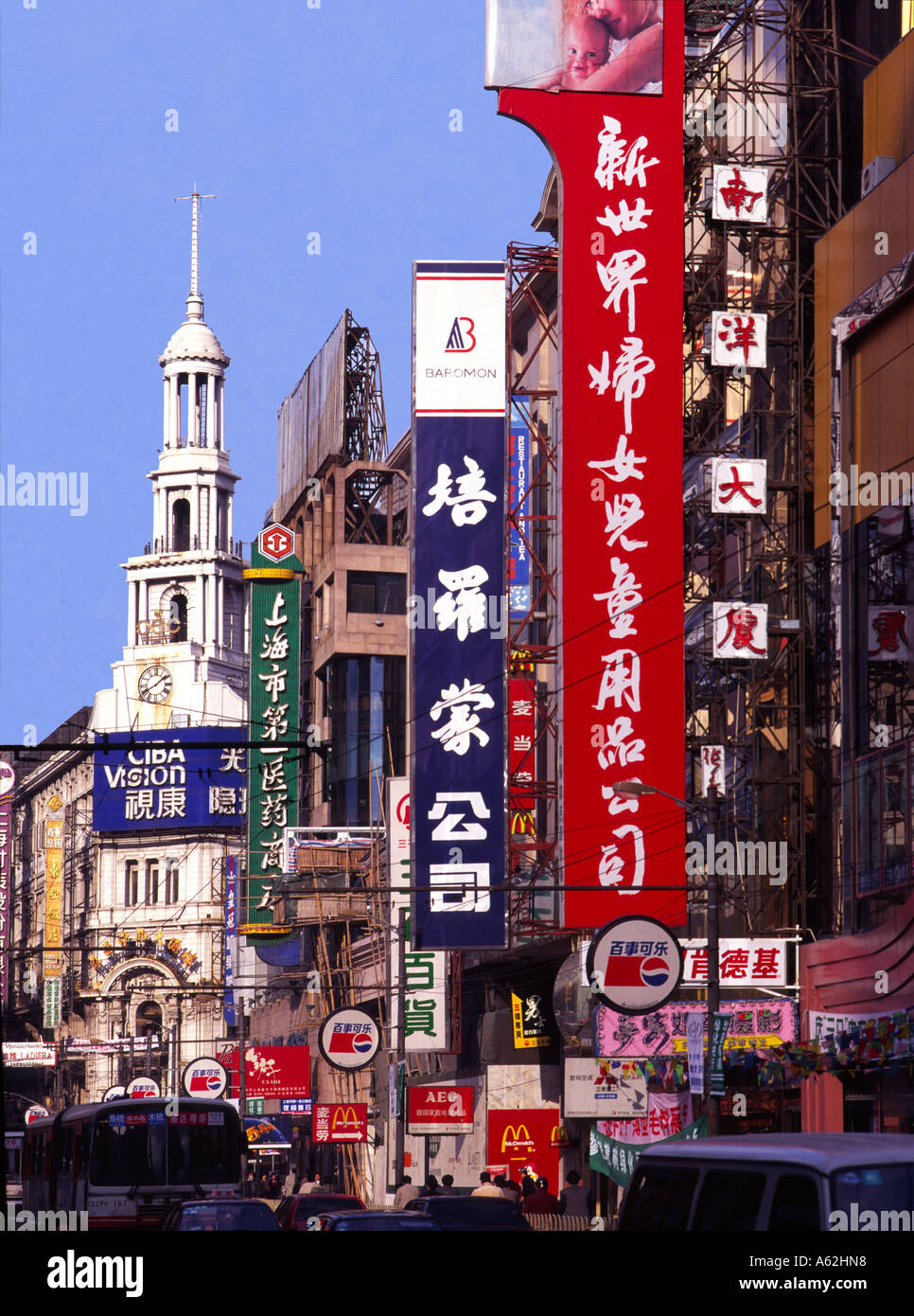 Buildings at roadside, Nanjing Road, Shanghai, China, Asia Stock Photo