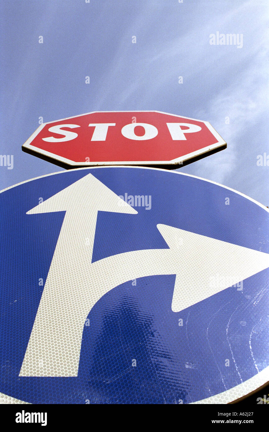 road signs stop and direction arrows Stock Photo - Alamy