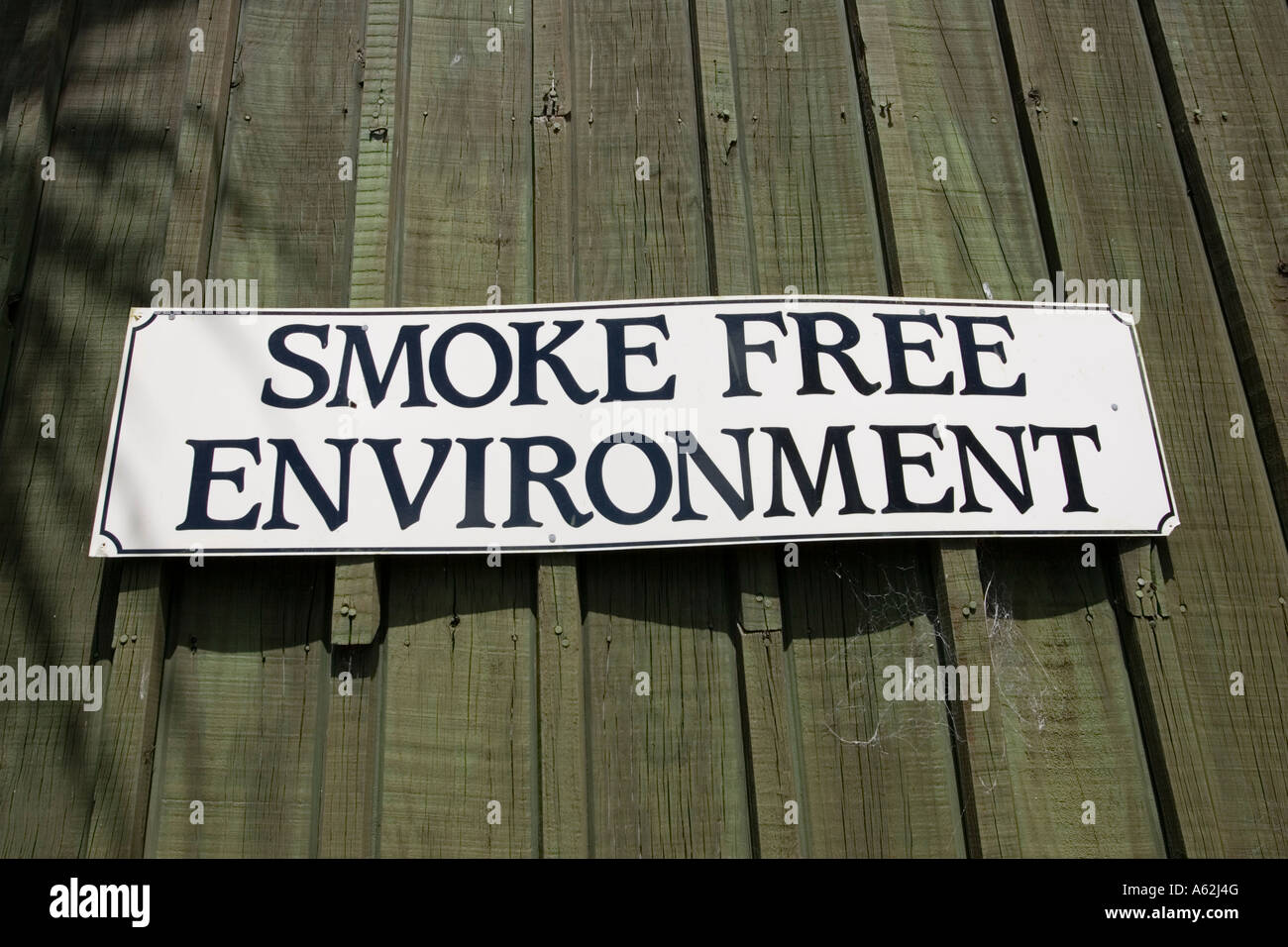 Smoke free environment notice on cafe Rotorua North Island New Zealand Stock Photo
