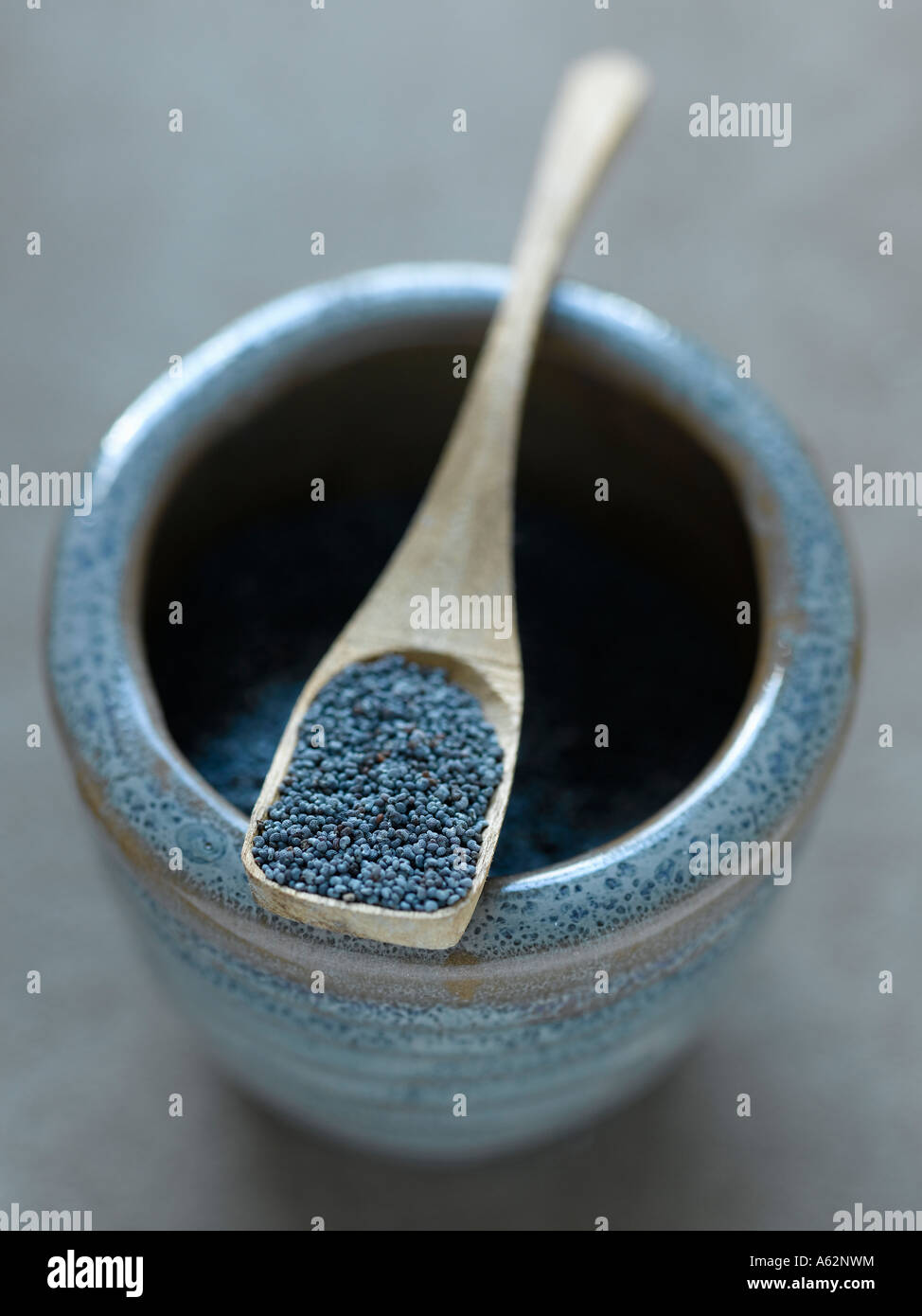 Blue poppy seeds Stock Photo - Alamy