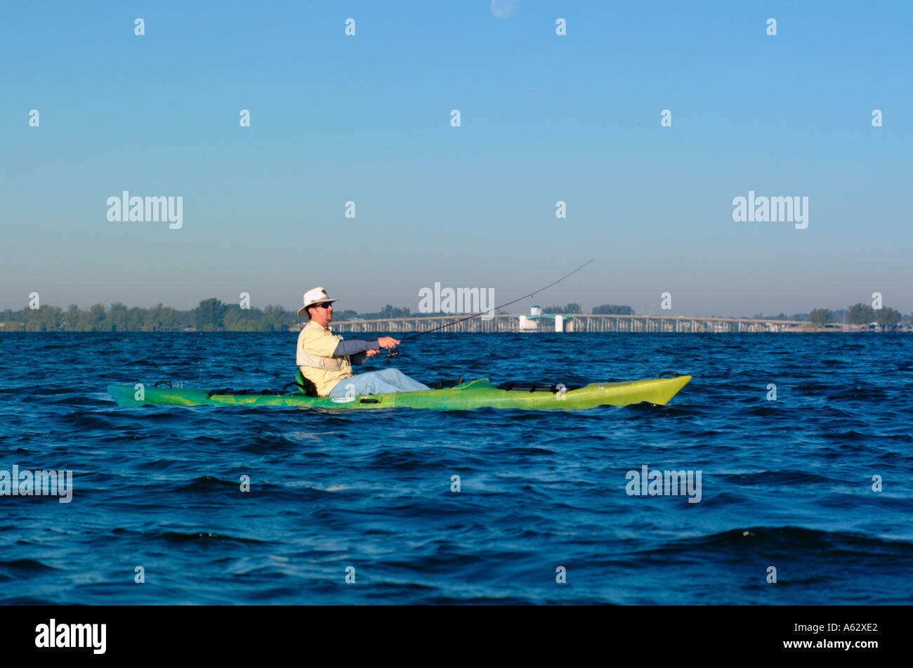 Man fishing from kayak Intracoastal waterway Indian River Lagoon Stuart