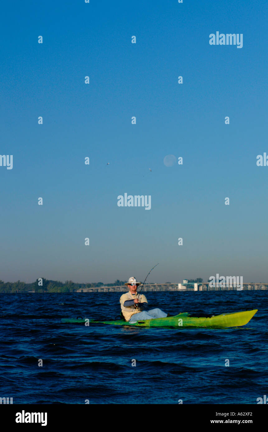 Man fishing from kayak Intracoastal waterway Indian River Lagoon Stuart