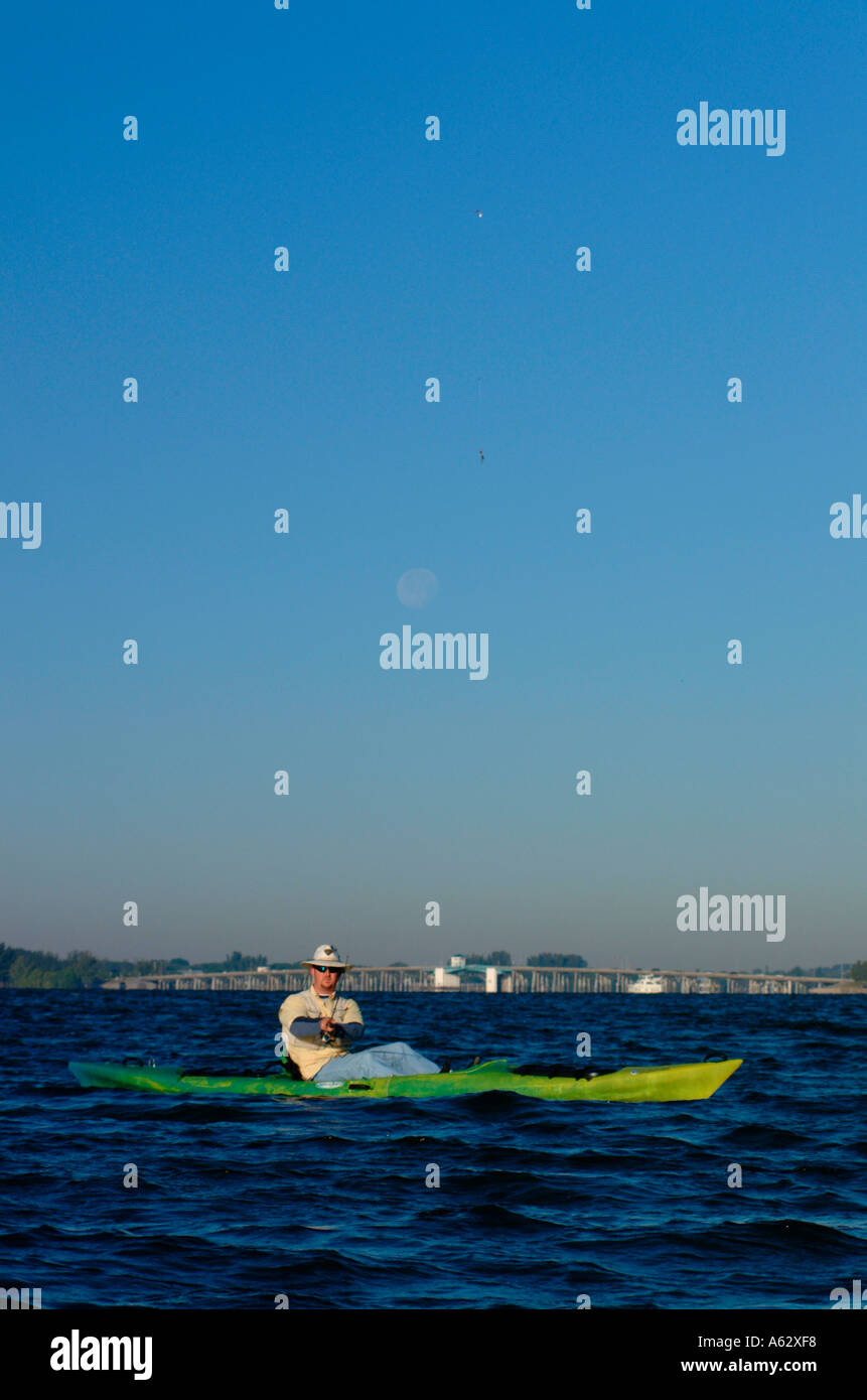 Man fishing from kayak Intracoastal waterway Indian River Lagoon Stuart