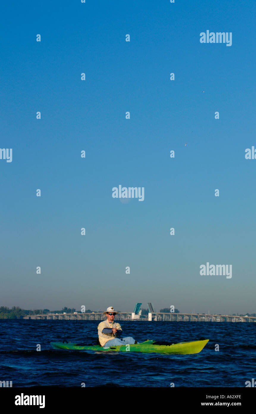 Man fishing from kayak Intracoastal waterway Indian River Lagoon Stuart